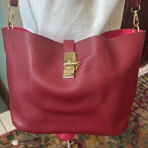 Tony Rivera   Small tote. large purse
Pebbled leather outer  suede interior NWOT